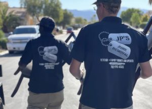JP's junk removal team getting rid of an old kitchen set