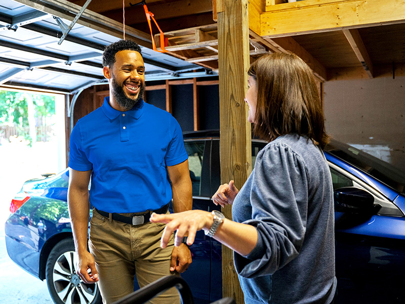 Junk Removal Expert with Client